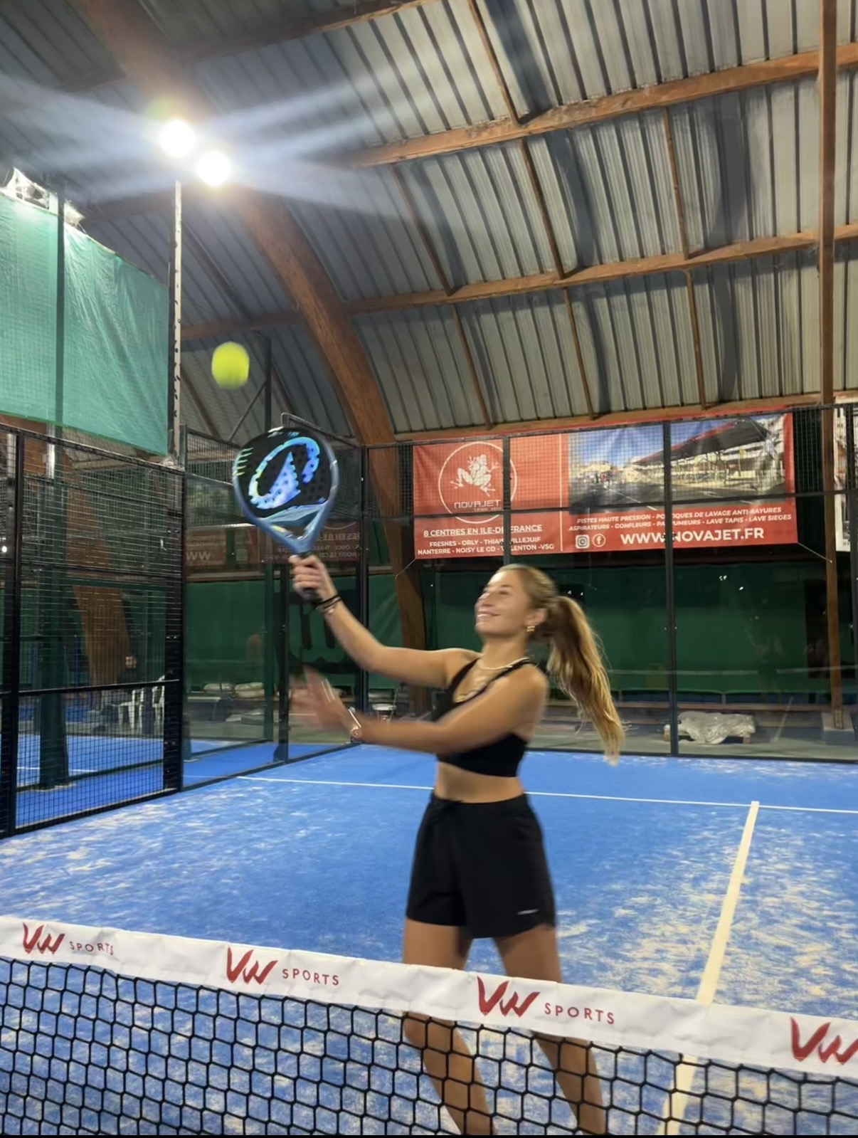 Carla playing padel